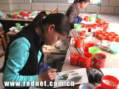 純樸自然倍受青睞 張家界砂石畫走出國門